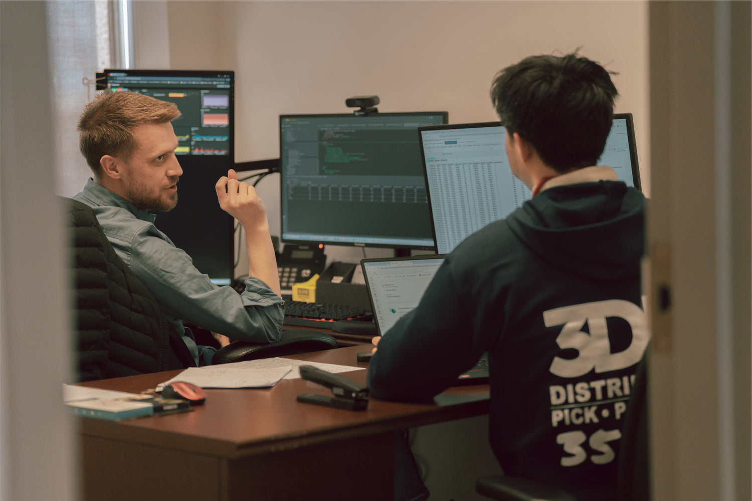 3DM IT team discussion technology strategies